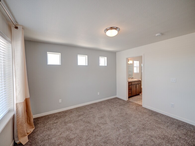9278 Turlough master bedroom with view to the master bath. - 9278 Turlough Hts