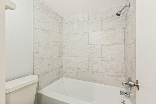 Experience a touch of luxury in this beautifully designed bathroom. - Country Club