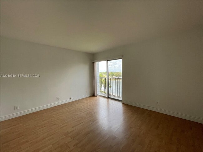 Building Photo - 8560 N Sherman Cir
