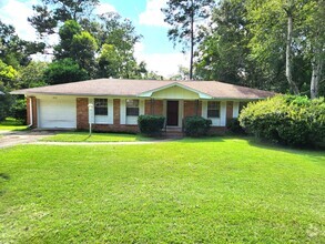 Building Photo - Updated 3 bedroom house, all wood floors, ...