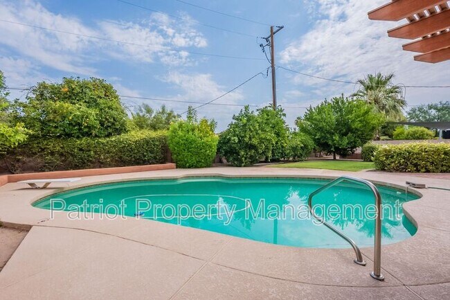 Building Photo - 7024 E Orange Blossom Ln