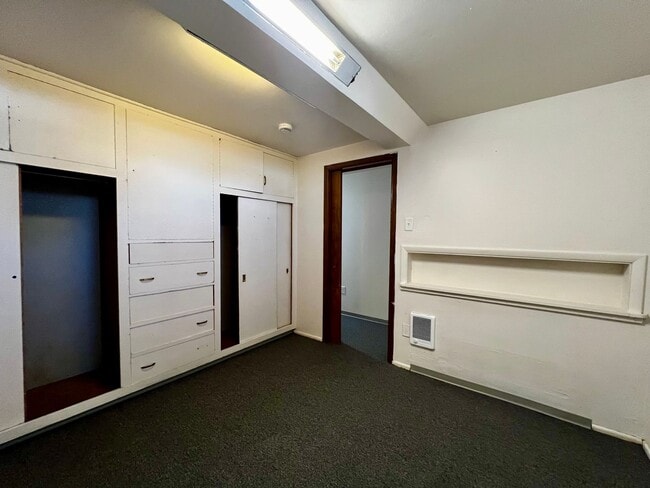 Building Photo - Non-Refundable & Security Deposit Total: $1500.00