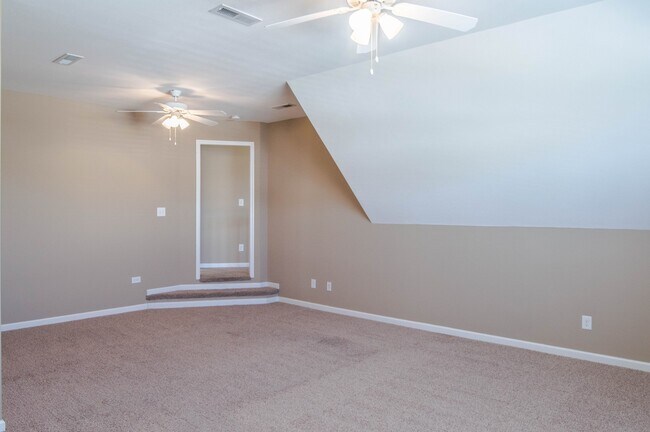 Building Photo - Pet Friendly Three Bedroom with Bonus!