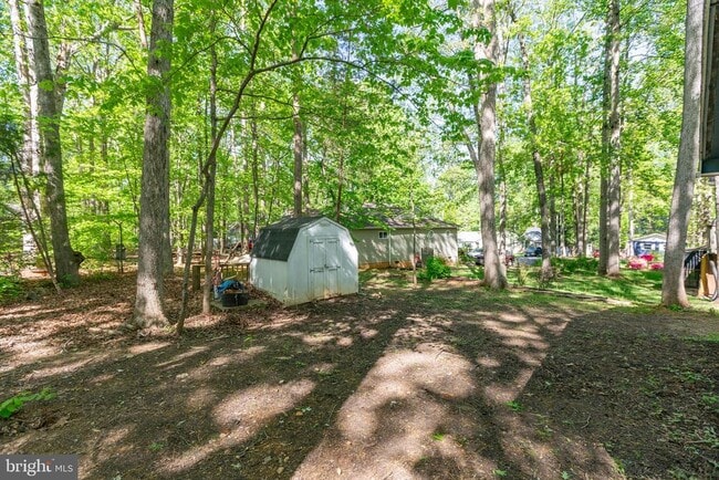 Building Photo - 303 Wilderness Dr