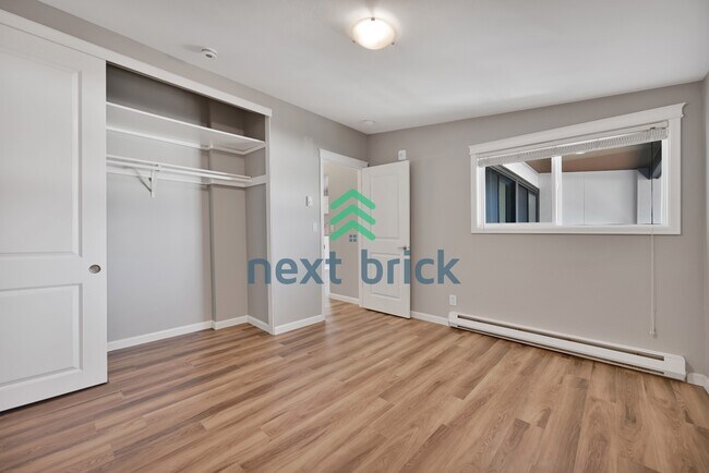 Building Photo - Downtown Bellevue Living | 2BR Condo with Storage & Balcony
