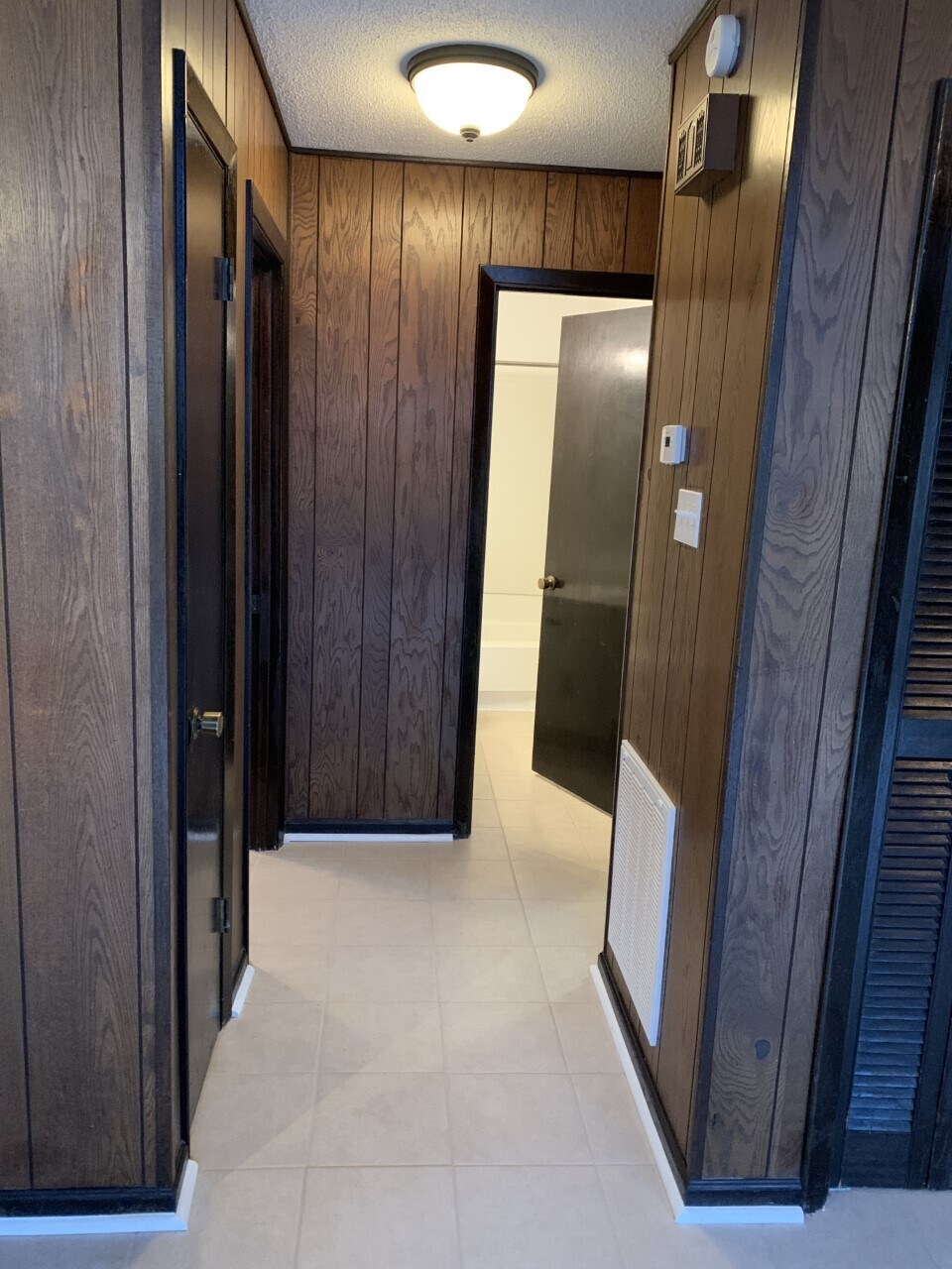 Hallway w/ Linen Closet and New Thermostat - 519 E Churchwell Ave