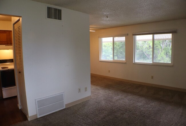 Building Photo - Bright Top Floor 1-Bedroom Near CSU + $200...