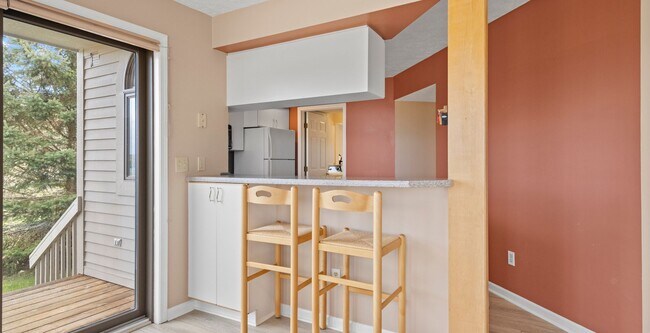 Building Photo - Lakefront End-Unit Condo with Crystal Lake...