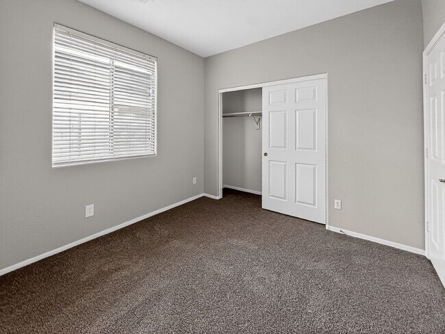 Building Photo - Single-level 4 bed, 2 bath home with tandem 3-car garage and RV gate.