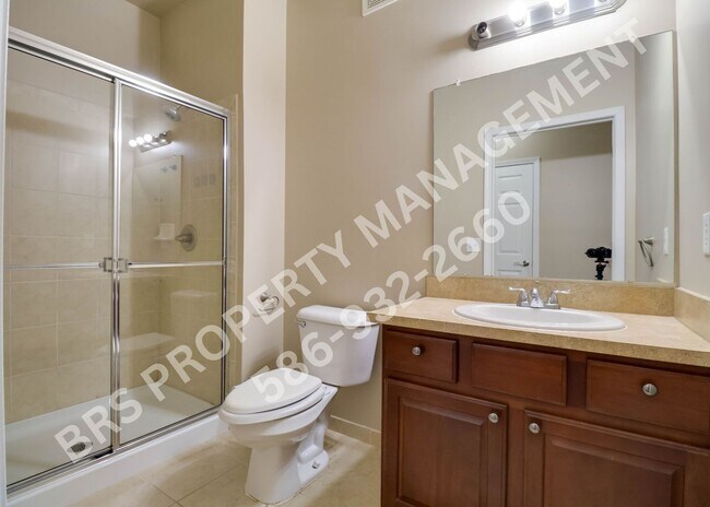 Building Photo - Ground Floor 2 BR, 2 BA condo with attached garage