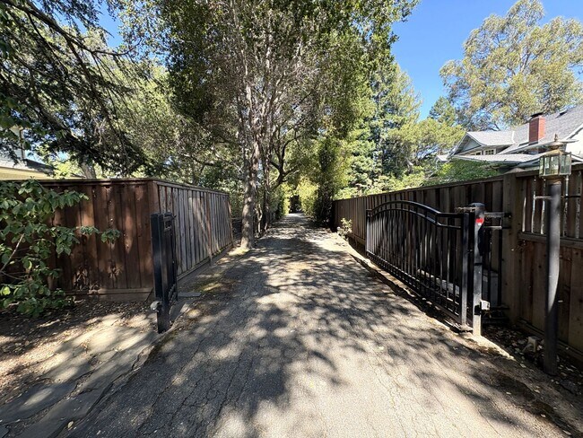 Building Photo - Beautiful Serene 4-Bedroom Home on a Gated...