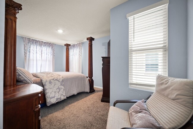 Building Photo - Spacious 4-Bedroom Home with Fenced Yard & Community Amenities – Available June 30th!