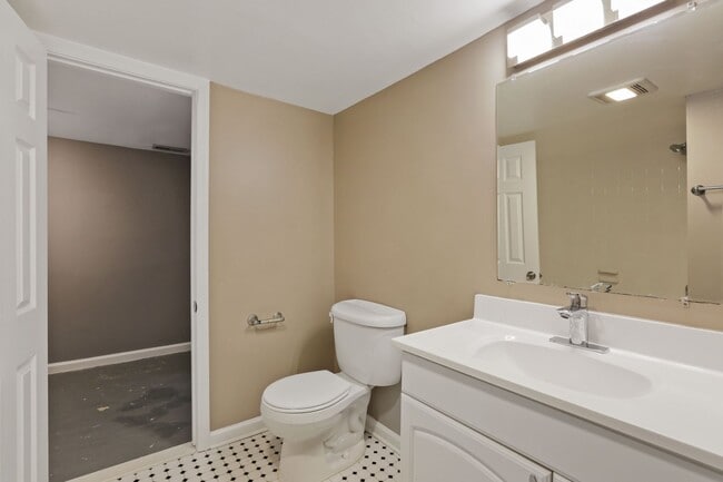 Building Photo - Move-In Ready Cape Cod with 3 Finished Levels & Huge Backyard