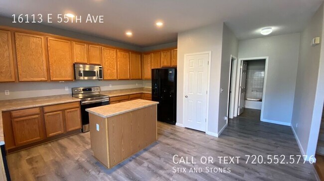 Building Photo - 16113 E 55th Ave