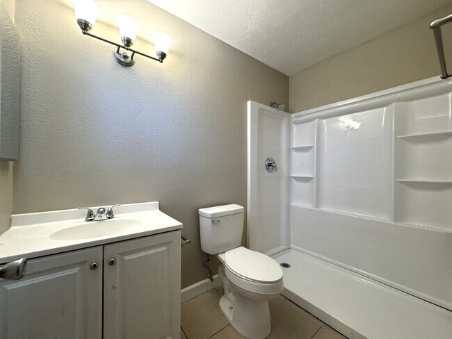 Building Photo - CORNER LOT 3 BEDROOM PLUS DEN WITH FIREPLACE AND LARGE YARD