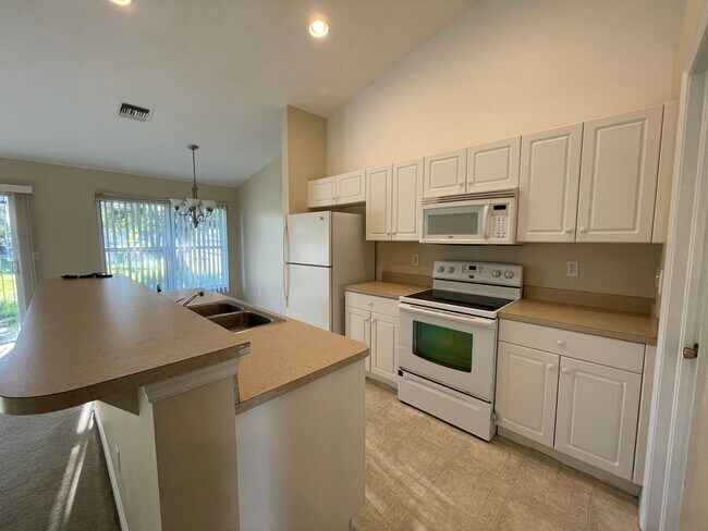 Building Photo - PRICE REDUCTION: Spacious and Charming 3 B...