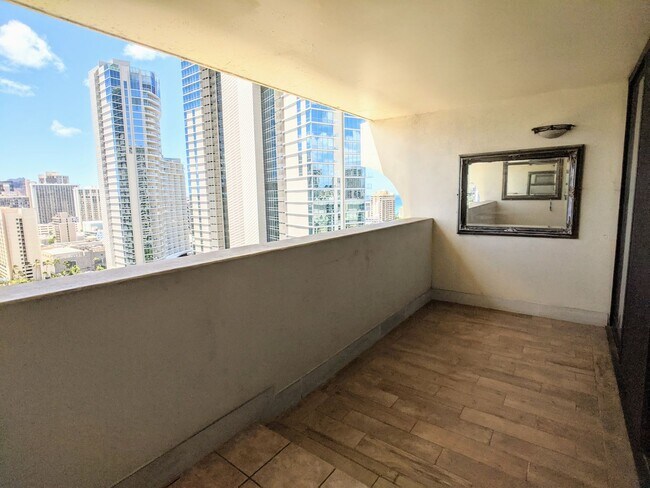 Building Photo - Sweeping Views from this partially furnished 1 Bed 1 Bath Condo w/ 1 Covered Parking