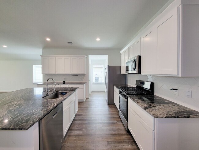 Building Photo - This stunning 4-bedroom, 2-bathroom Rosharon lease features modern upgrades, an open-concept layo...