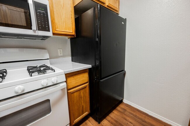 Building Photo - Like-New 2BR/2BA Condo in Gated Manzanita Community – Vaulted Ceilings & Fireplace!