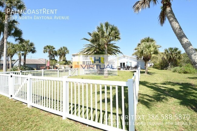 Building Photo - FULLY FURNISHED AND FENCED. Lawn care incl...