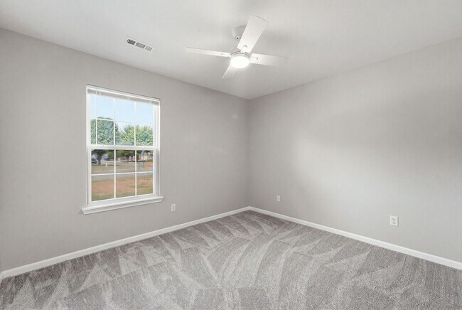 Building Photo - This beautiful ranch-style home