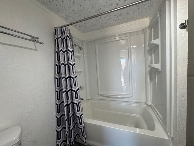 Building Photo - Parially Furnished 2BR 1BA Remodeled-Fenced Yard + RV/Coach cement Parking