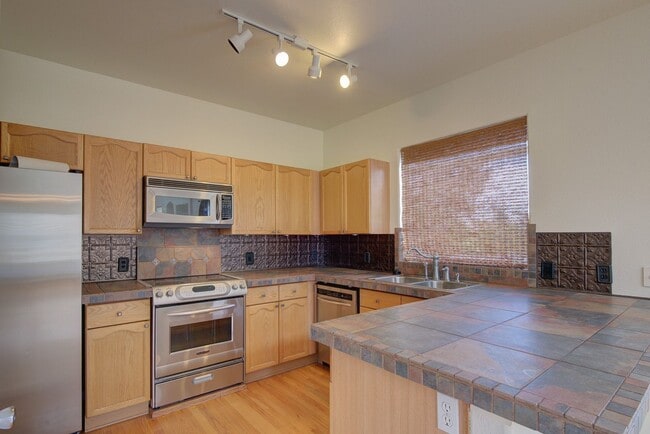 Building Photo - Beautiful home with 3 bedrooms, 2 1/2 bathrooms, 2-car garage ready to move in!  NO PETS & NO SMO...