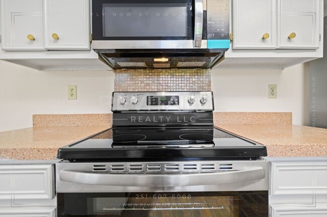 Building Photo - Spacious 4BR/2.5BA West Mobile Home – Room to Grow in a Convenient Location!