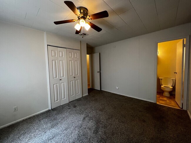 Building Photo - 3 Bedroom, 1.5 Bathroom, Brick Home with yard and Storage Building, Covered Porch