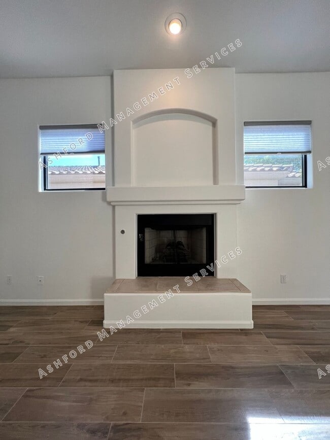 Building Photo - COME HOME TO LUXURY IN GATED GRAYHAWK GOLF...