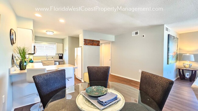 Building Photo - SIESTA KEY! DIRECT WATER VIEWS! PET FRIEND...