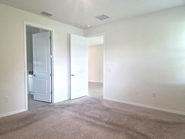 Building Photo - 55+ Gated Community at Palms at Serenoa