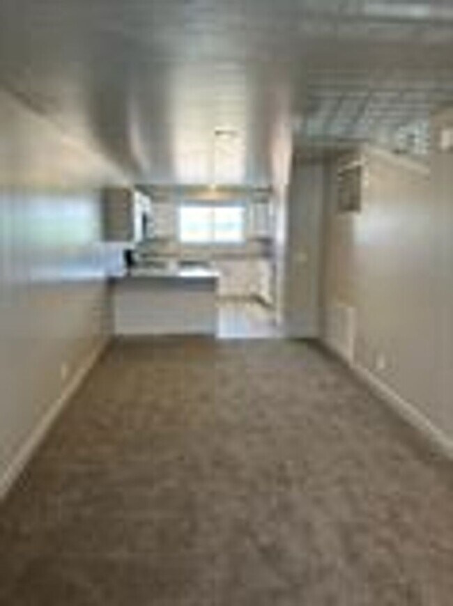 Building Photo - Red Vista Condos!