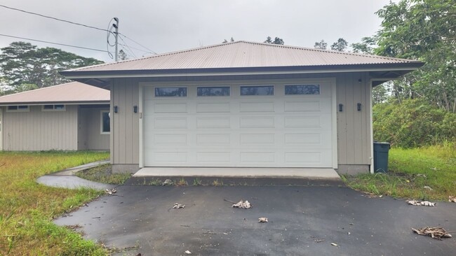 Building Photo - This 3-bedroom, 2-bath home in Orchidland Subdivision
