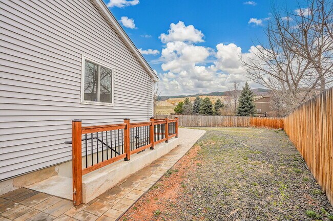 Building Photo - $3,295.95 - 3 bed, 2 bath updated Home in Littleton with Two Full Kitchens and Impressive Yard!
