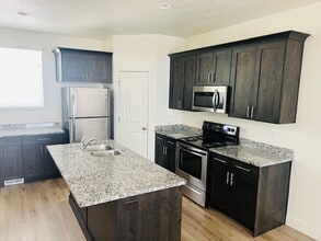 Building Photo - Beautiful townhome with garage and central...