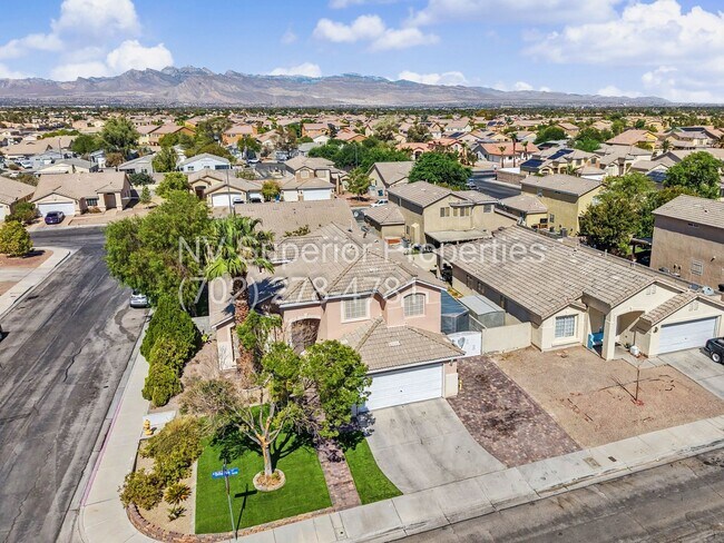 Building Photo - NW!! 4 bedrooms!! Bed & Bath DownStairs!!! RV Parking!!! Synthetic Grass Front yard!! Real Grass ...