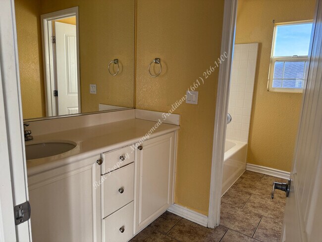 Building Photo - New Year Special! 50% Off First Month's Rent!