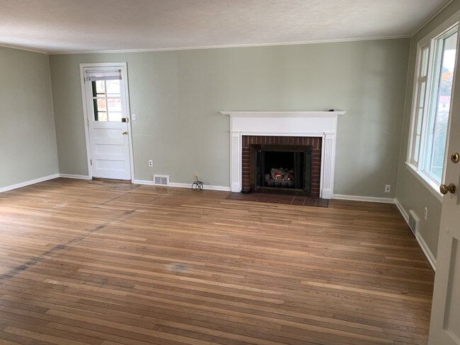 Living room with fireplace - 1947 Decatur Ave