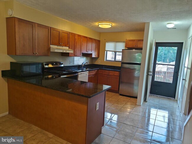 Building Photo - 15245 Coachman Terrace