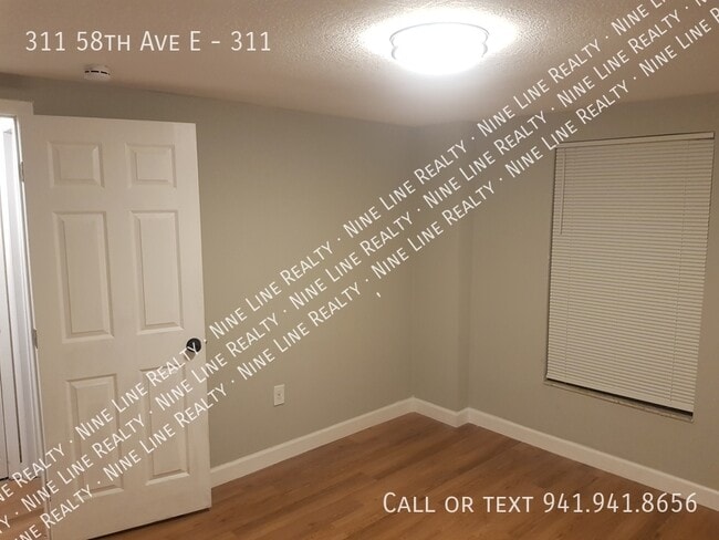 Building Photo - 311 58th Ave E