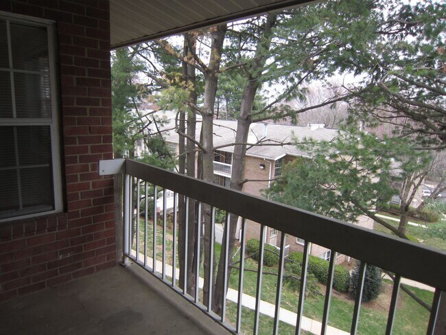 Building Photo - Conveniently located near Tysons, Metrobus, the Toll Road, and West Falls Metro.