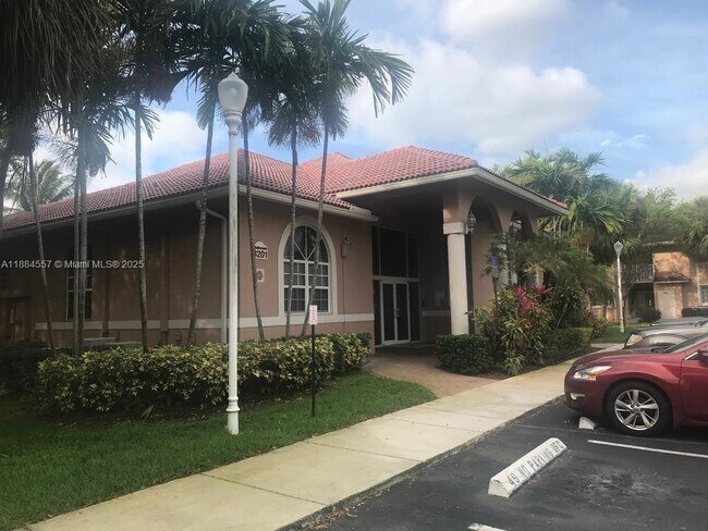 Building Photo - 3211 Sabal Palm Manor