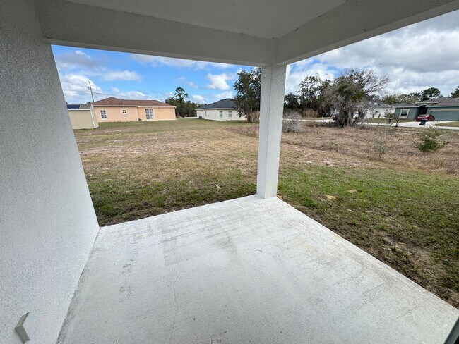 Building Photo - Spacious 4-Bedroom Home in Poinciana – Internet Included & No HOA Approval Required