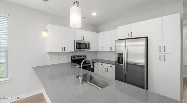 Building Photo - 8067 Purchase Ne Pl