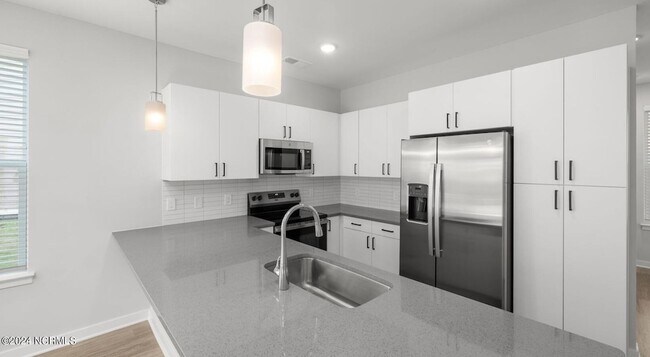 Building Photo - 8067 Purchase Pl