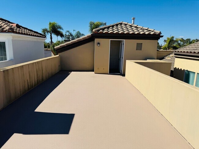 Building Photo - Elevated Coastal Living in Downtown Huntington Beach with Private Rooftop Retreat