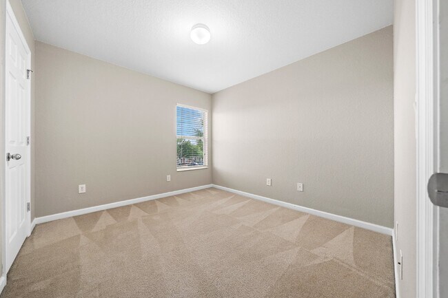 Building Photo - Corner Unit ~ Lake View ~ Maintenance Free...