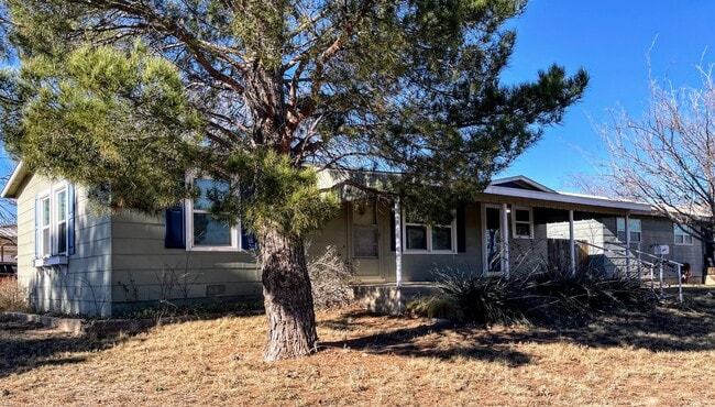 Building Photo - Your New Snyder Sanctuary: Modern Updates, Massive Storage & a Cozy Porch
