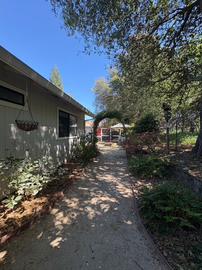 Building Photo - Your Private Escape – Charming Ranch-Style Home with Room to Breathe!